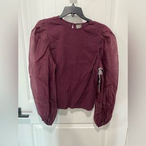 Womens stylish blouse with puffy sleeves